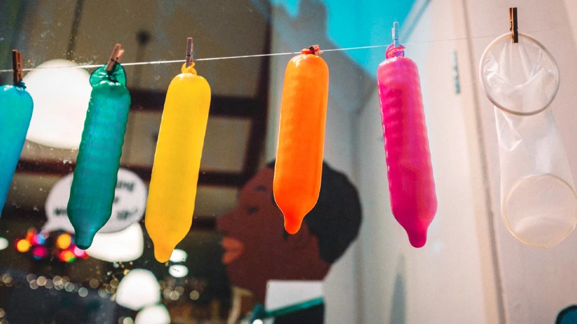 Colorful-Condoms-Hanging-On-Rope-1296x728-header.jpg