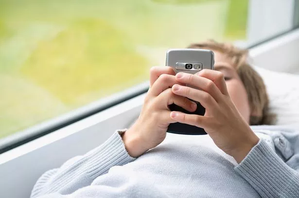 Boy-texting.jpg