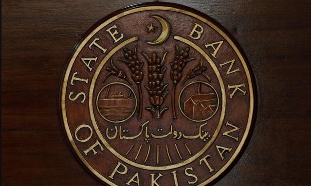 A logo of the State Bank of Pakistan is pictured on a reception desk at the head office in Karachi, July 16, 2019. — Reuters