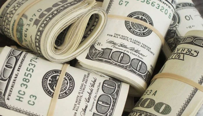 749809_3881498_dollars_akhbar.jpg