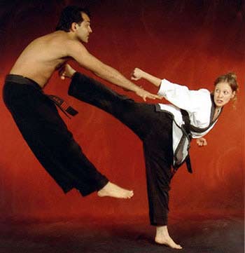DY-woman-kicking-man-in-air.jpg