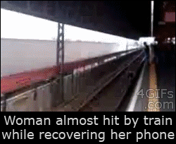 Train-phone-close-call.gif