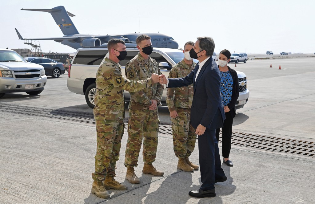Secretary of State Antony Blinken and troops