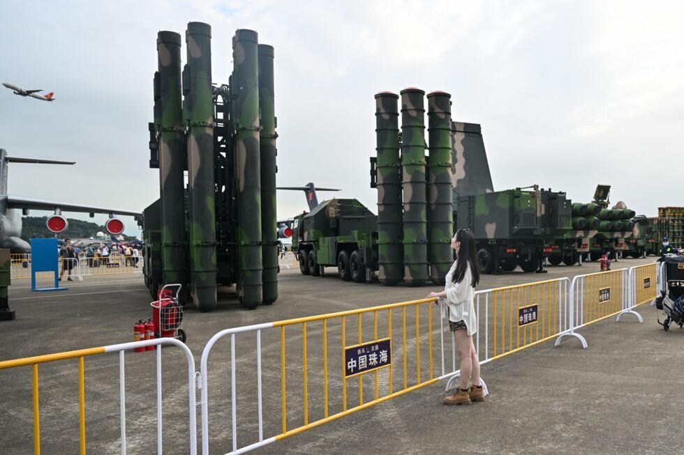 File photo of China's HQ-9B surface-to-air missile system (L) and HQ-19 surface-to-air missile system taken during the China International Aviation and Aerospace Exhibition in Zhuhai, Guangdong on November 15, 2024.