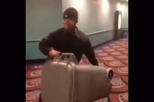 guy-throwing-trash-can-at-someone.gif