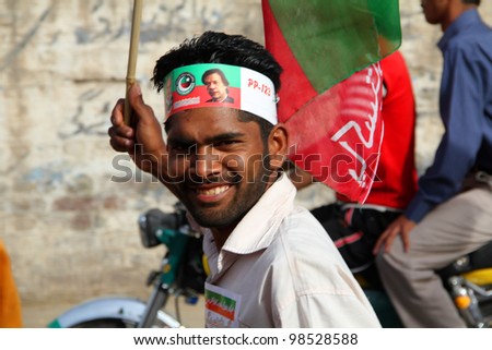 stock-photo-sialkot-pakistan-mar-pti-supporter-at-jinnah-cricket-stadium-during-a-political-rally-of-98528588.jpg