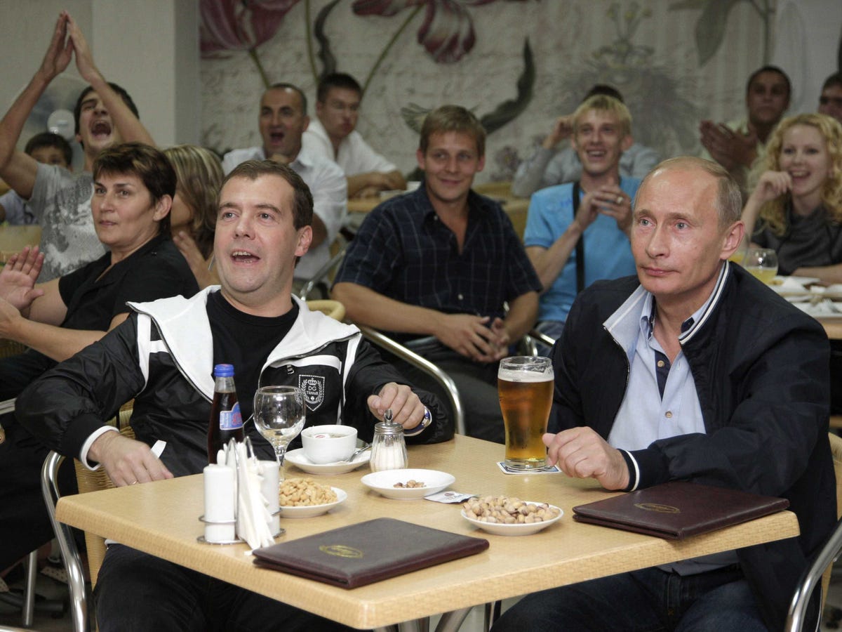 and-in-this-shot-putin-kicks-back-and-relaxes-with-loyal-second-in-command-dmitry-medvedev-as-they-watch-a-soccer-match.jpg
