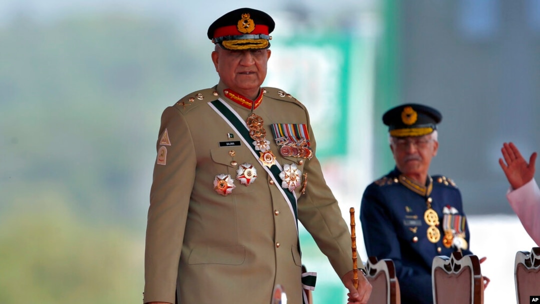 FILE - Pakistan's Army Chief General Qamar Javed Bajwa arrives at a military parade to mark Pakistan National Day in Islamabad, Pakistan, March 23, 2022. 