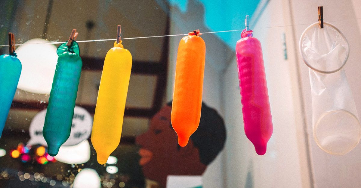 Colorful-Condoms-Hanging-On-Rope-1200x628-facebook-1200x628.jpg