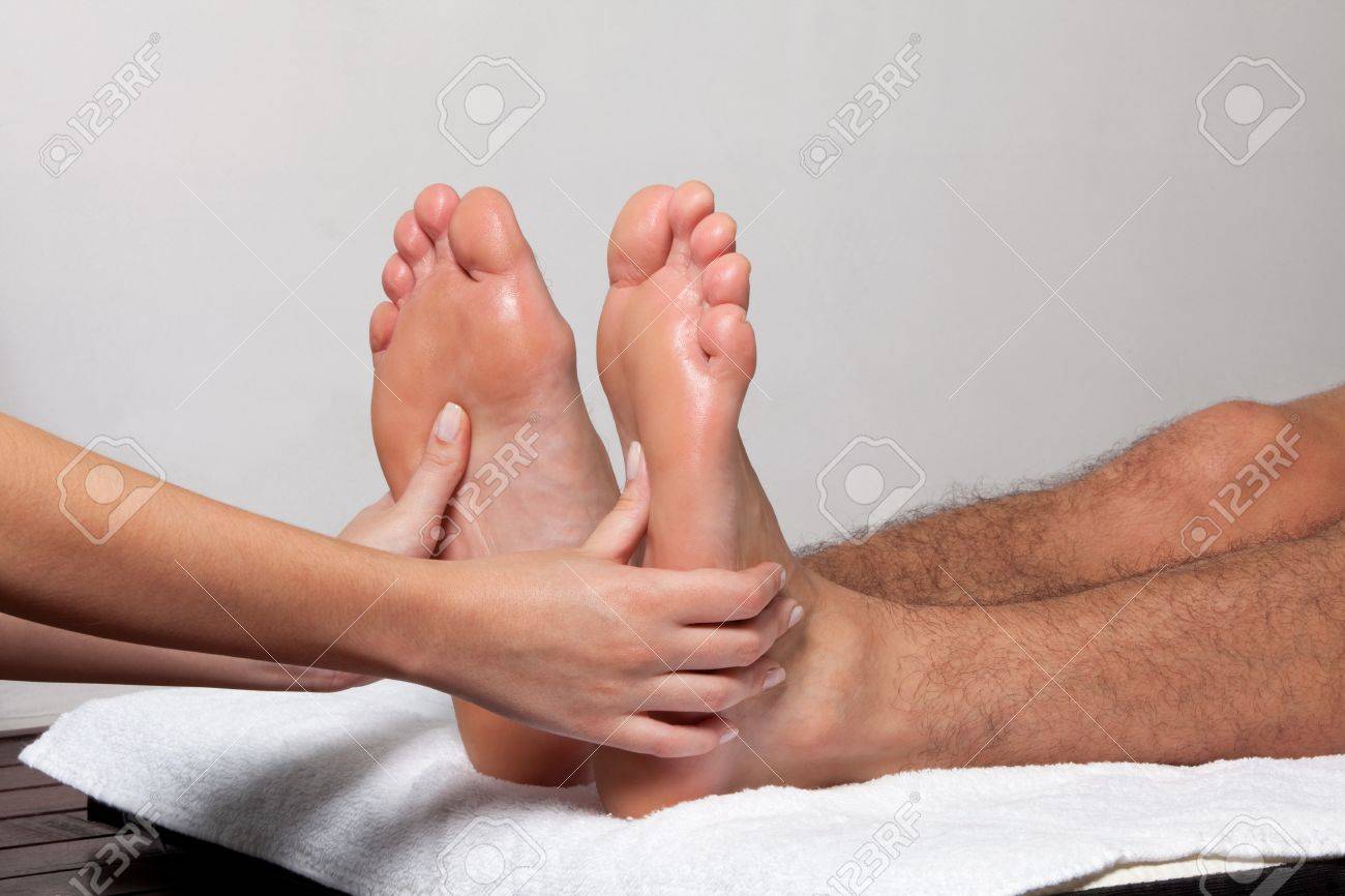 15347736-man-receiving-a-foot-massage-in-spa.jpg